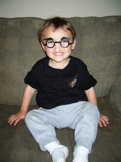 Elijah wearing funny nose and glasses