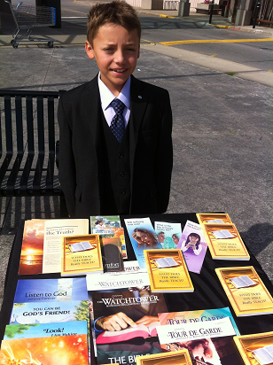 Elijah at a lterature display table